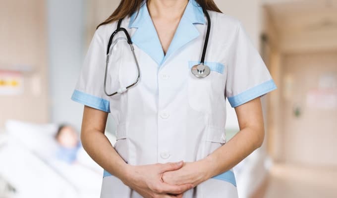 Female neurologist at her desk